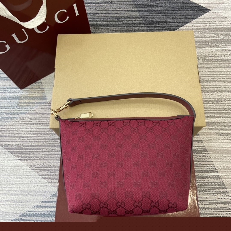 G*u*i top handle bags